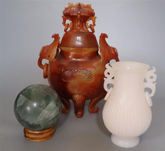 A Chinese chalcedony censer and cover, 27cm high and a Chinese white glass vase and a green quartz ball